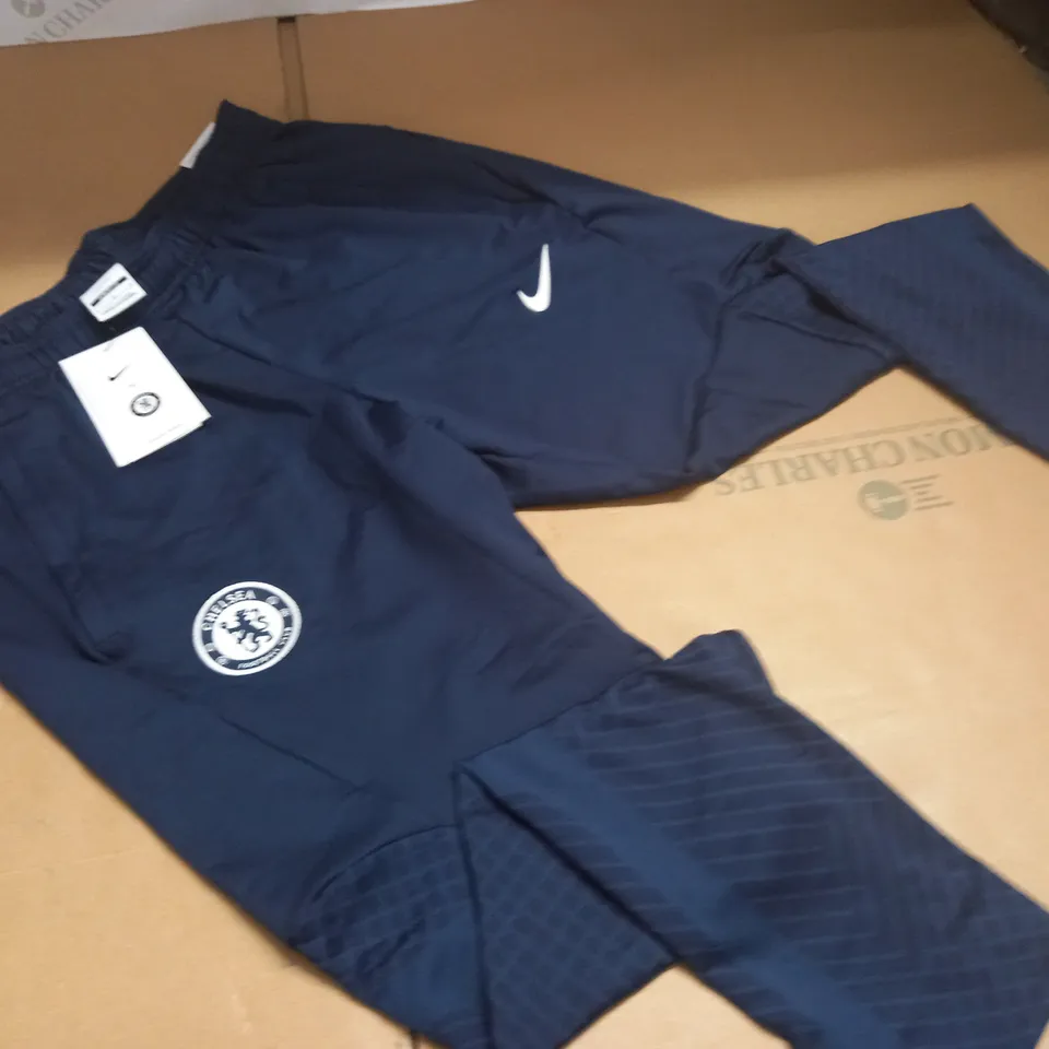 CHELSEA FC NIKE TRACK PANTS IN NAVY - L