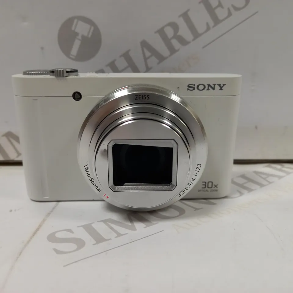 SONY DSCWX500 DIGITAL COMPACT HIGH ZOOM TRAVEL CAMERA WITH 180 DEGREES TILTABLE LCD SCREEN - CAMERA ONLY