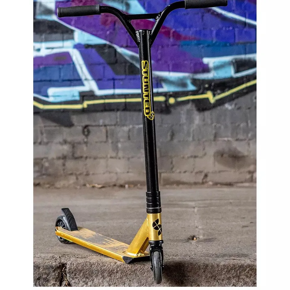 BOXED STUNTED GILT STUNT SCOOTER IN BLACK/GOLD