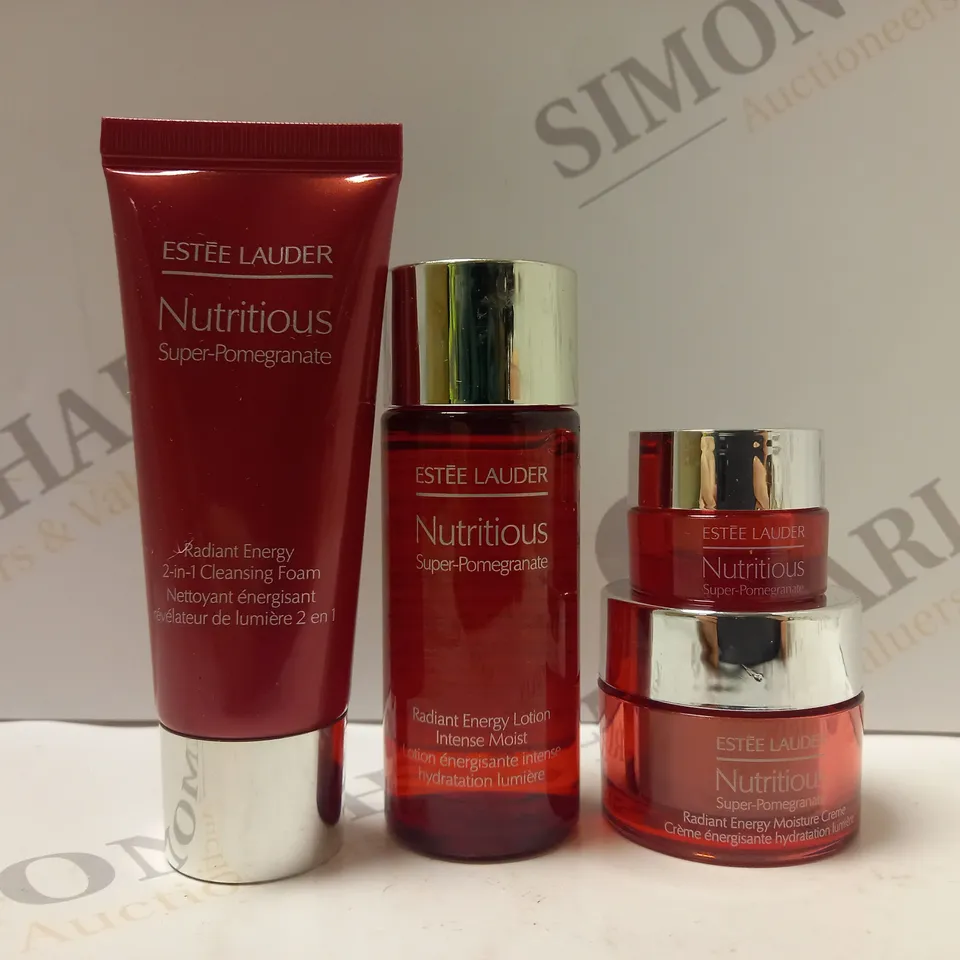 BOX OF 4 ASSORTED ESTEE LAUDER PRODUCTS TO INCLUDE CLEANSING FOAM, RADIANT ENERGY LOTION, MOISTURE CREAM, EYE JELLY