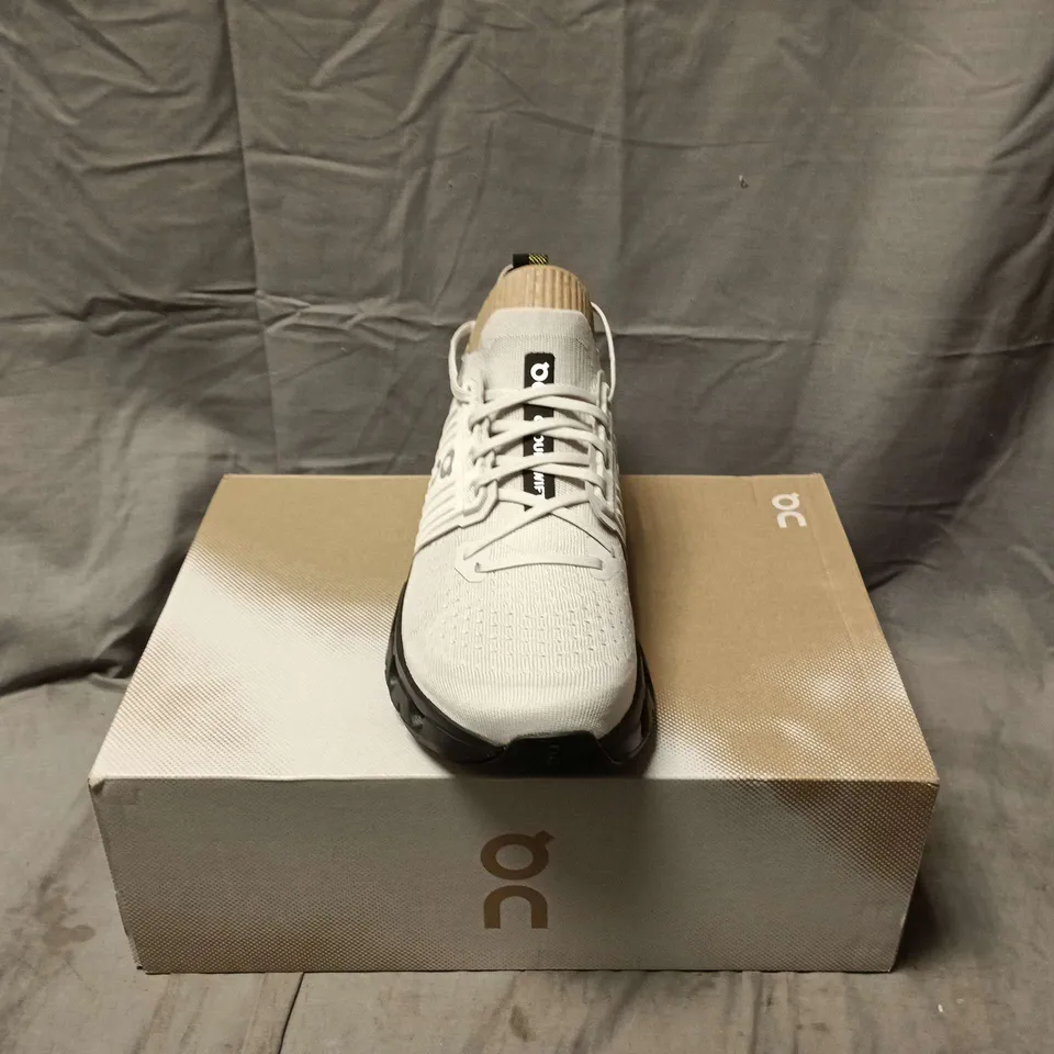 BOXED PAIR OF ON CLOUDSWIFT 4 TRAINERS IN WOLF/BLACK - UK 10.5