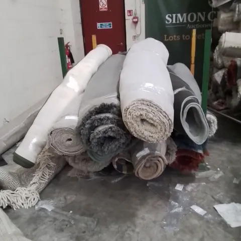 STILLAGE OF APPROXIMATELY 20 QUALITY DESIGNER RUGS