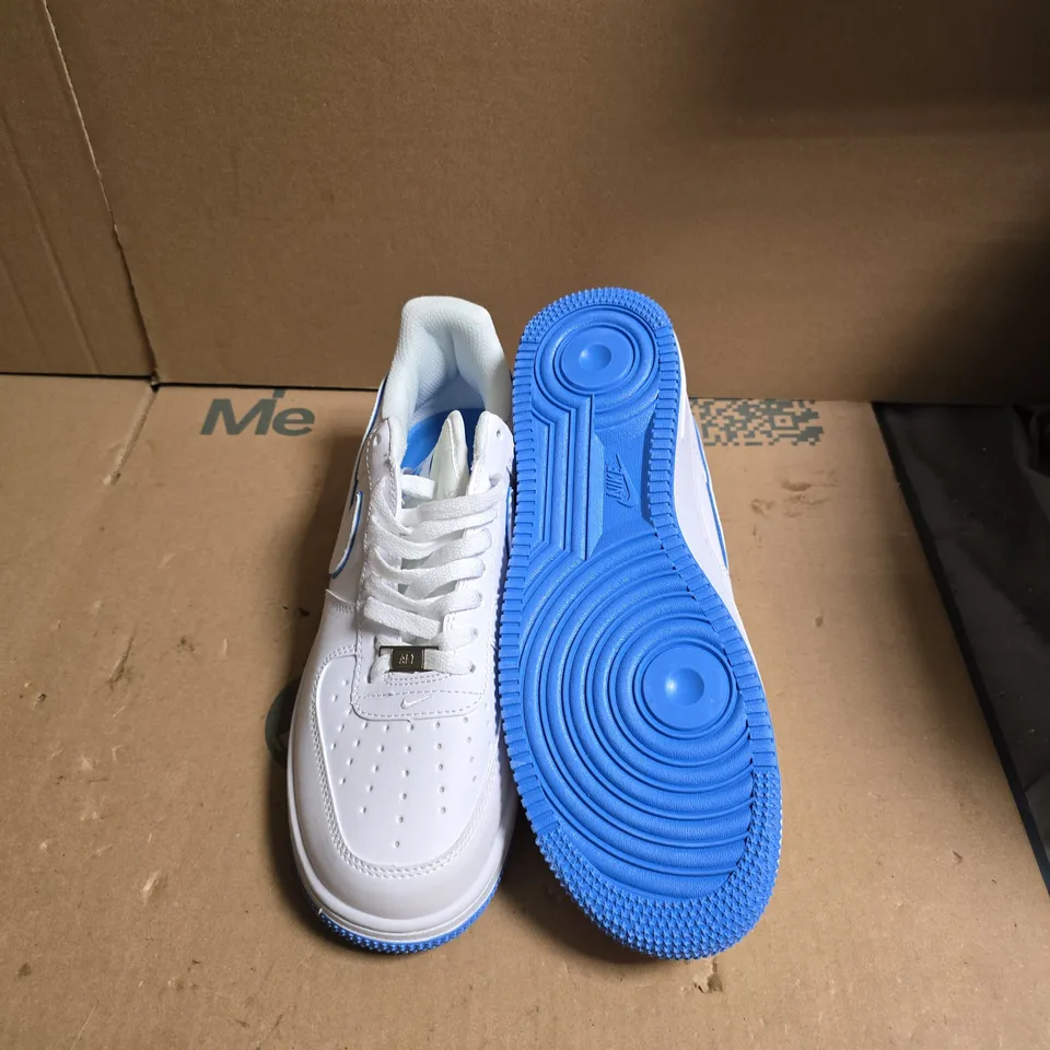 NIKE AIR WHITE TRAINERS WITH BLUE OUTSOLE - UK SIZE 9 