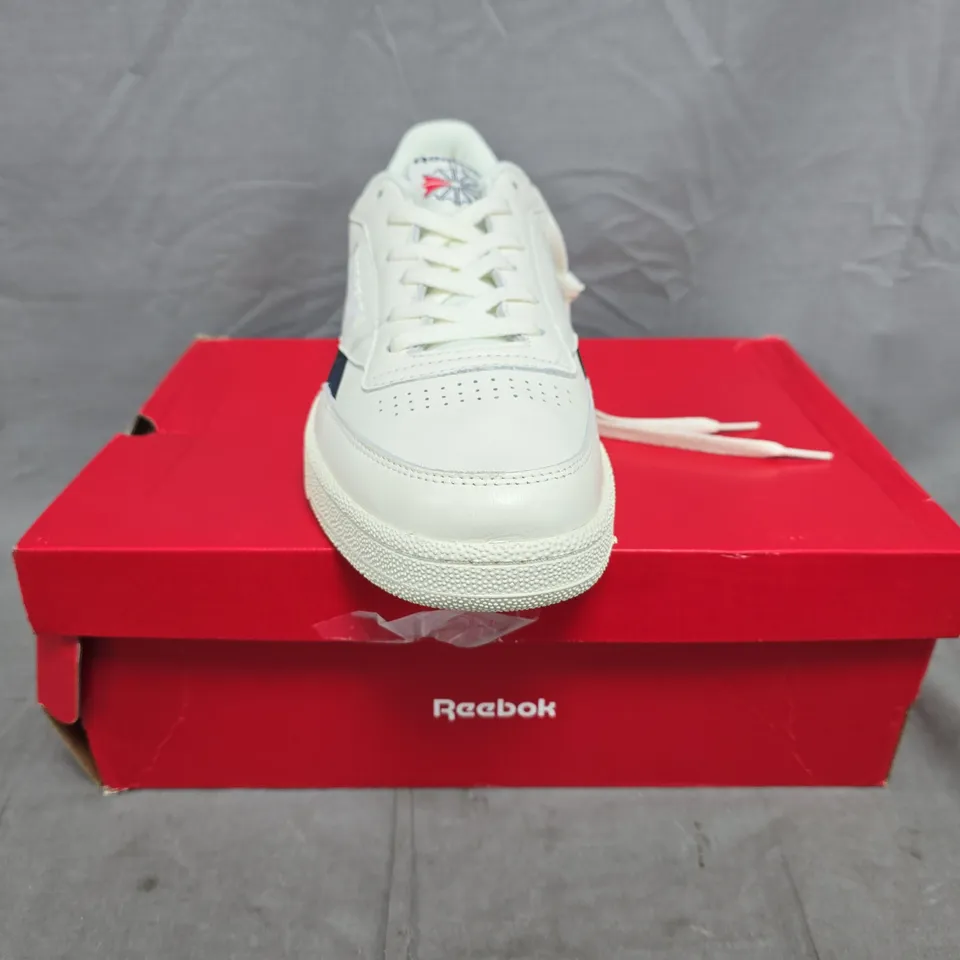 BOXED PAIR OF REEBOK CLUB C REVENGE TRAINERS IN OFF-WHITE/NAVY SIZE UK 10.5