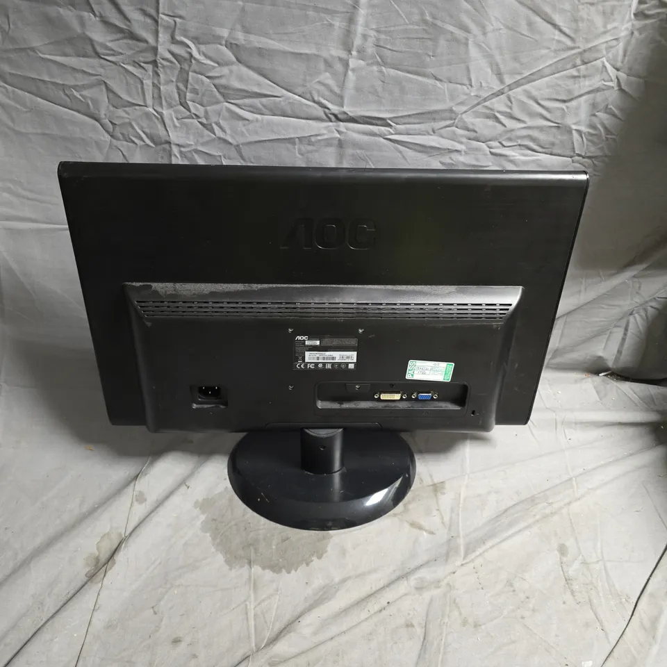 AOC COMPUTER MONITOR – BLACK LCD ON ROUND STAND. NO POWER PACK INCLUDED