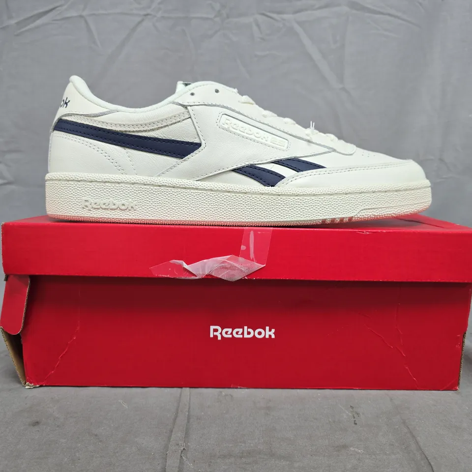 BOXED PAIR OF REEBOK CLUB C REVENGE TRAINERS IN OFF-WHITE/NAVY SIZE UK 10.5