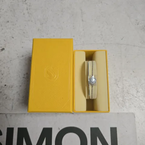 SWAROVSKI SILVER-TONE BRACELET WITH PAVΓ DISC CHARM IN YELLOW PRESENTATION BOX