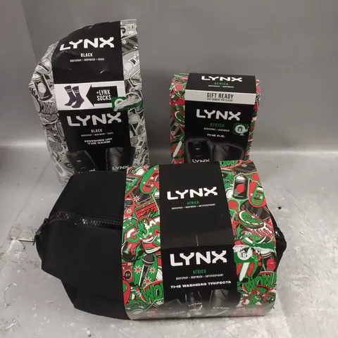 LOT OF 3 ASSORTED LYNX BOXSETS TO INCLUDE - BLACK SOCKS SET - AFRICA WASHBAG TRIFECTA - AFRICA BODY DUO