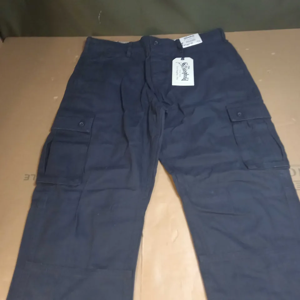 THE STRONGHOLD RELAXED STRAIGHT JEANS SIZE W34