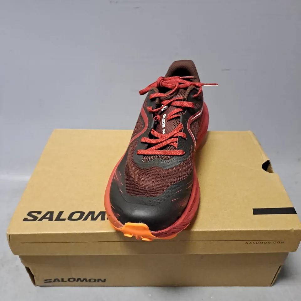 BOXED PAIR OF SALOMON GLIDE MAX TRAINERS IN RED MULTI SIZE 8.5