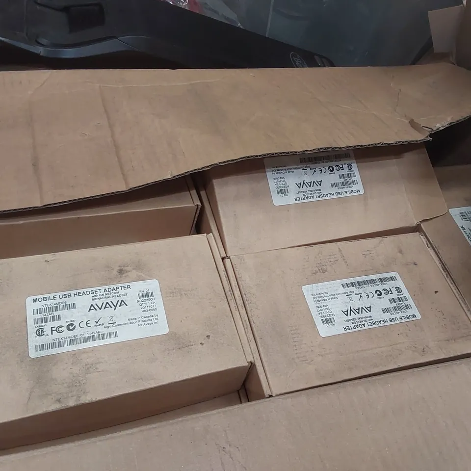 PALLET CONTAINING A LARGE ASSORTMENT OF OFFICE SUPPLIES INCLUDING: HEADSETS, PORTABLE ESPRESSO MAKERS,  FIBER OPTIC PATCH CORDS ECT