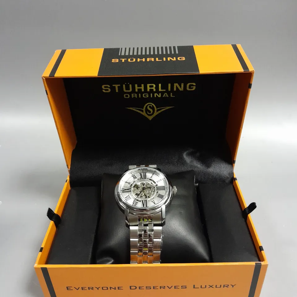 STUHRLING MENS AUTOMATIC SKELETON DIAL WATCH 