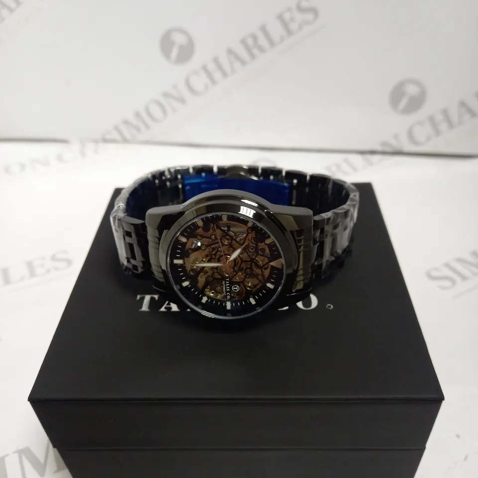 MEN’S TALIS CO 7820 AUTOMATIC WATCH – BLACK SKELETON DIAL AND CASE – STAINLESS STEEL STRAP – GLASS BACKCASE.