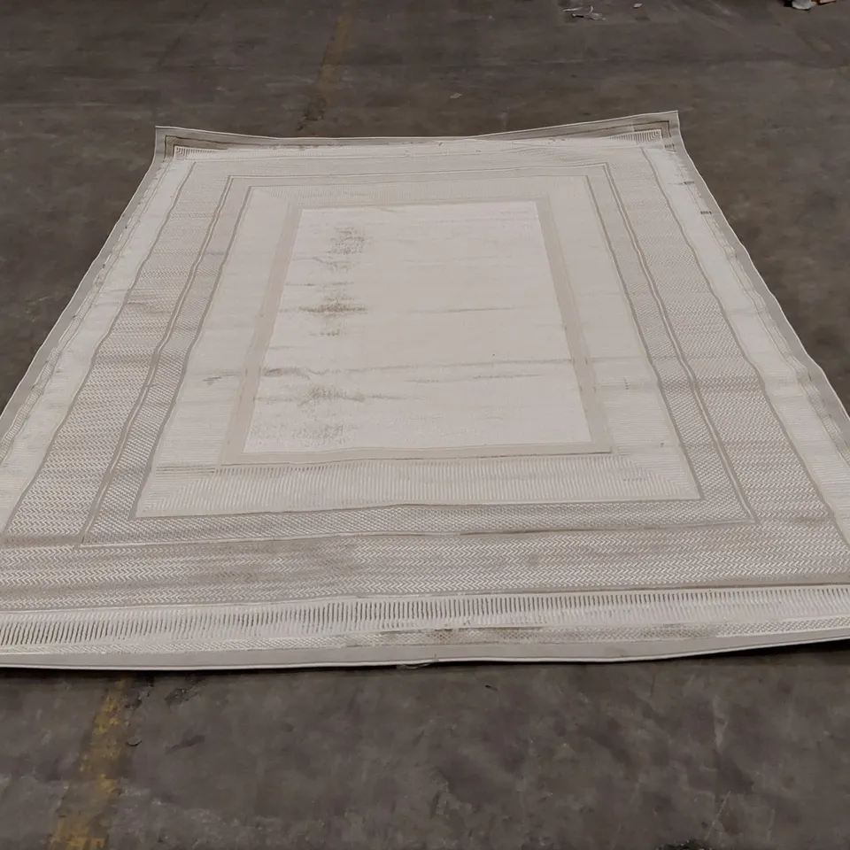 ABYE MACHINE WOVEN RUG IN IVORY - 239 x 300cm