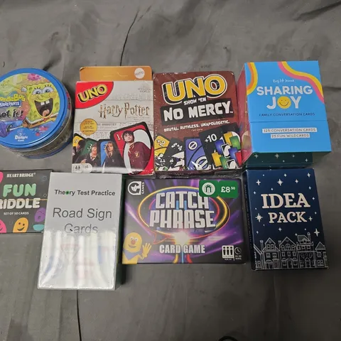 LOT OF 8 ASSORTED CARD GAME PACKS TO INCLUDE SHARING JOY AND UNO