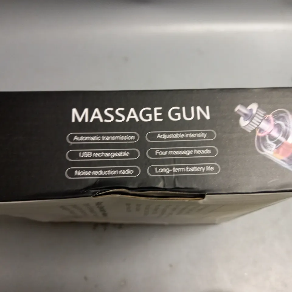 BOXED MASSAGE GUN WITH 4 INTERCHANGEABLE HEADS