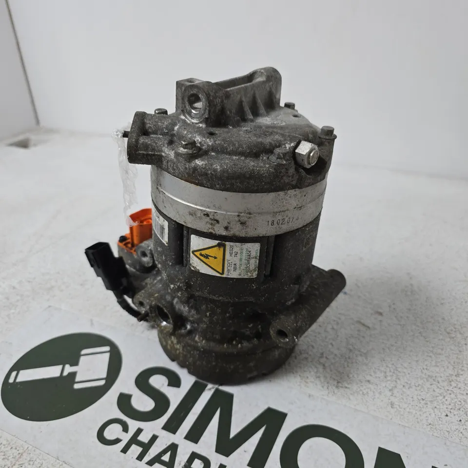 AIR CONDITIONING COMPRESSOR