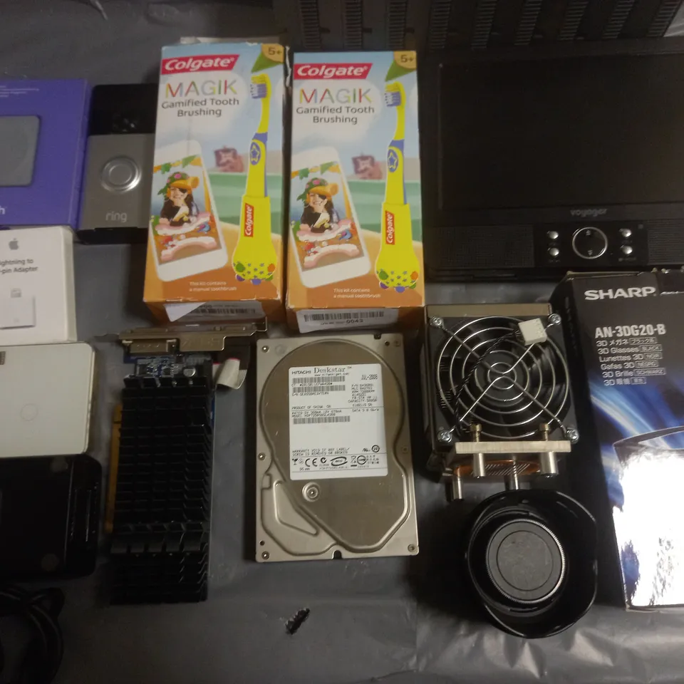 LOT OF APPROXIMATELY 15 ASSORTED TECH ITEMS TO INCLUDE SHARP 3D GLASSES, COLGATE KIDS TOOTHBRUSHES AND LOGITECH POP HOME SWITCH