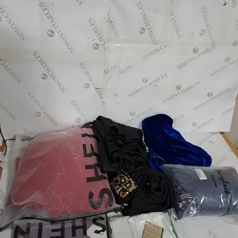 LARGE BOX OF ASSORTED CLOTHING ITEMS IN VARIOUS COLOURS AND SIZES INCLUDING TROUSERS , TOPS AND JUMPERS 