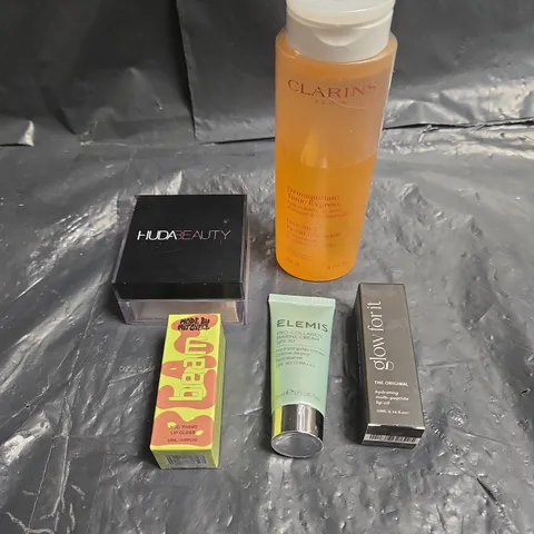 LOT OF 5 ASSORTED COSMETIC PRODUCTS TO INCLUDE - CLAIRINS ONE-STEP FACIAL CLEANSER - HUDA BEAUTY POUND CAKE SETTING POWDER - MADE BY MITCHELL BEAM LIP GLOSS IN BOO THANG - ETC