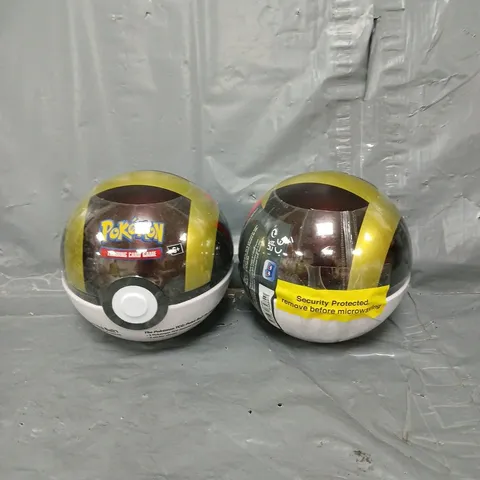 PAIR OF SEALED POKEMON TRADING CARD GAME POKE BALL TINS
