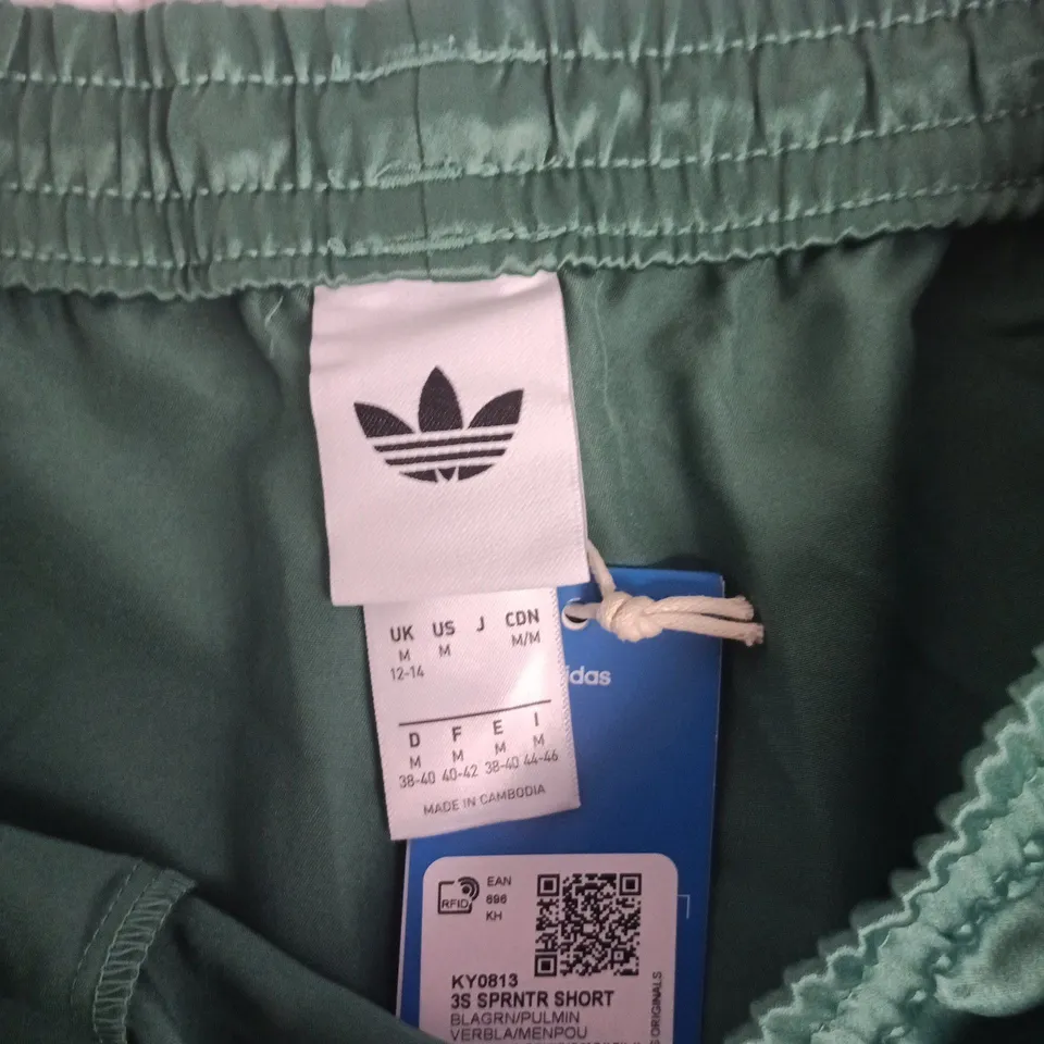 ADIDAS GREEN SHORTS – UK 12-14 (EU 38-40)