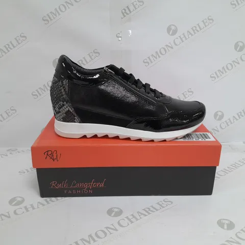 BOXED PAIR OF RUTH LANGSFORD WEDGE TRAINERS IN BLACK SIZE 8