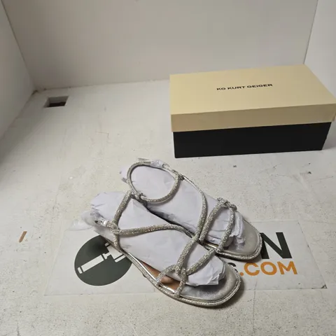 KURT GEIGER WOMENβS SILVER STRAPPY SANDALS β UK4 (EU37)