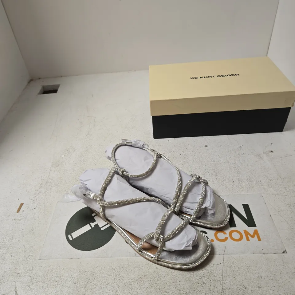 KURT GEIGER WOMEN’S SILVER STRAPPY SANDALS – UK4 (EU37)