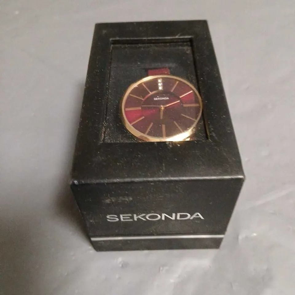 BOXED SEKONDA LADIES WATCH WITH RED THIN LEATHER STRAP