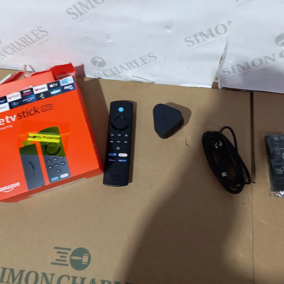 BOXED AMAZON FIRE TV STICK LITE