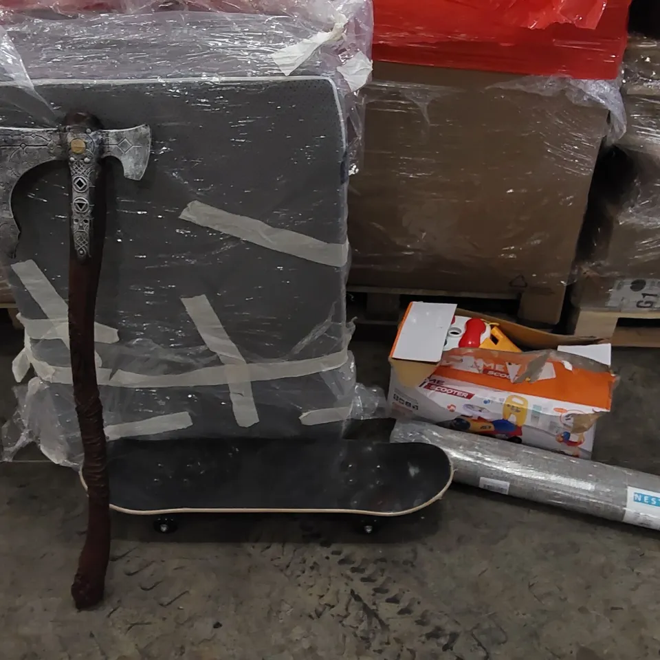 PALLET OF ASSORTED ITEMS INCLUDING: FOLDING MATTRESS, CHILDREN'S TOY, RUG, SKATEBOARD, COSTUME PROP AXE