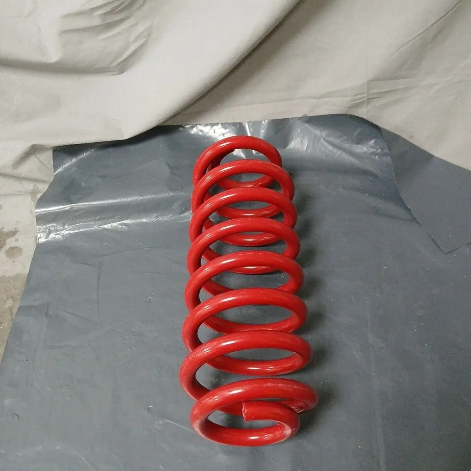 RED REAR SHOCK ABSORBER COIL SPRING, MOTORCYCLE. 