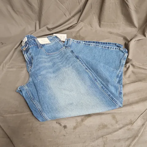 HOLLISTER LOW RISE BAGGY FLARE JEANS IN BLUE SIZE W32 SHORT