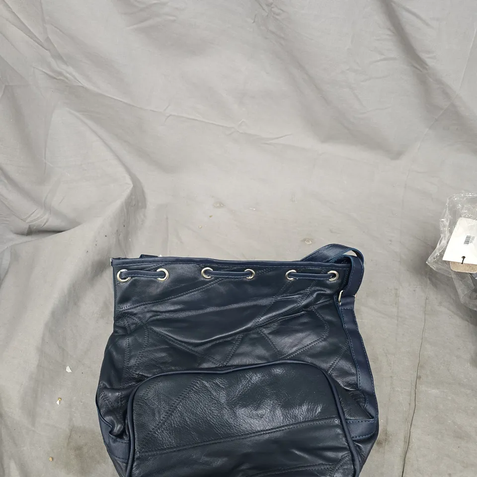 NAVY QUILTED SHOULDER BAG – GROMMET EYELET DETAIL 