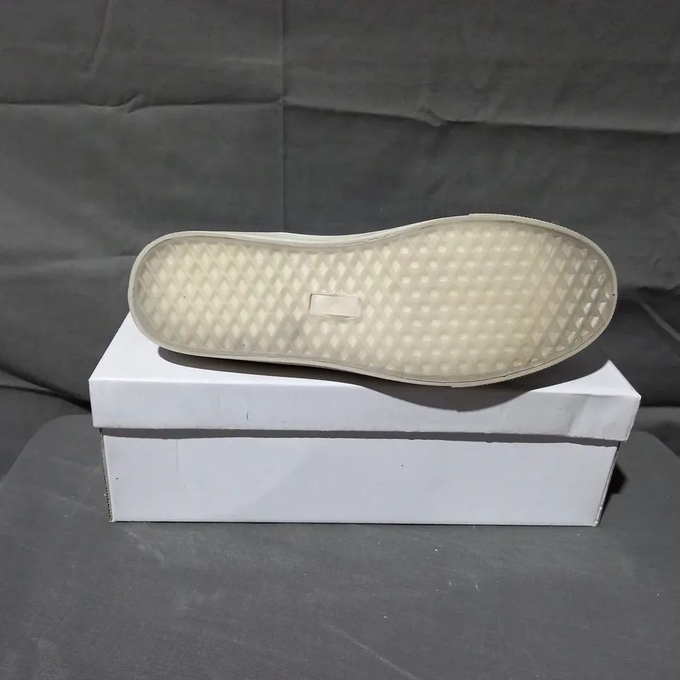 APPROXIMATELY 12 BOXED PAIRS OF W.S SLIP ON BLUE FLAT TRAINERS IN VARIOUS SIZES TO INCLUDE SIZES 38, 39, 40 