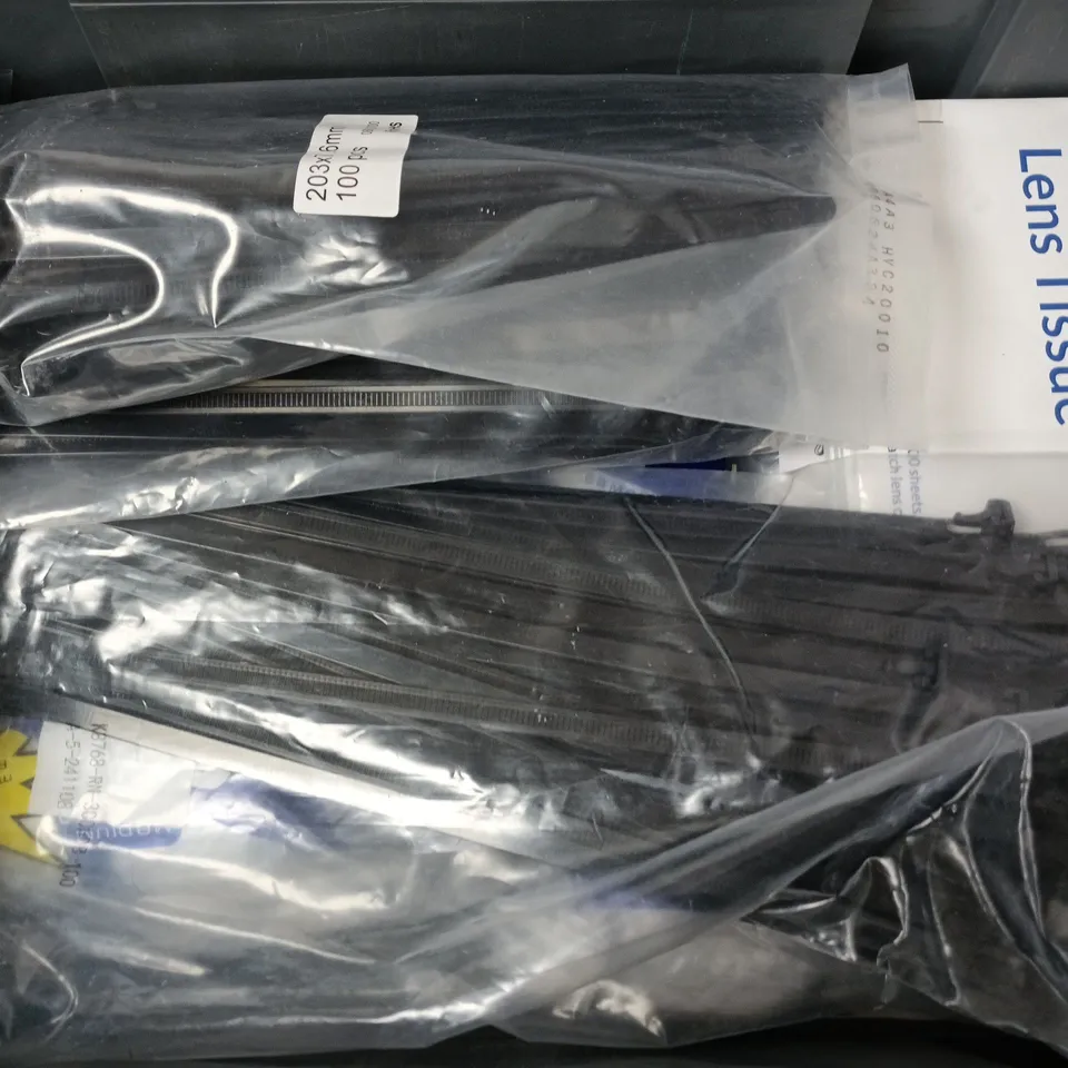 APPROXIMATELY 12 ASSORTED HOUSEHOLD ITEMS TO INCLUDE ZIP TIES, CAP IT BIOPLASTIC COVERS, LENS TISSUES, ETC