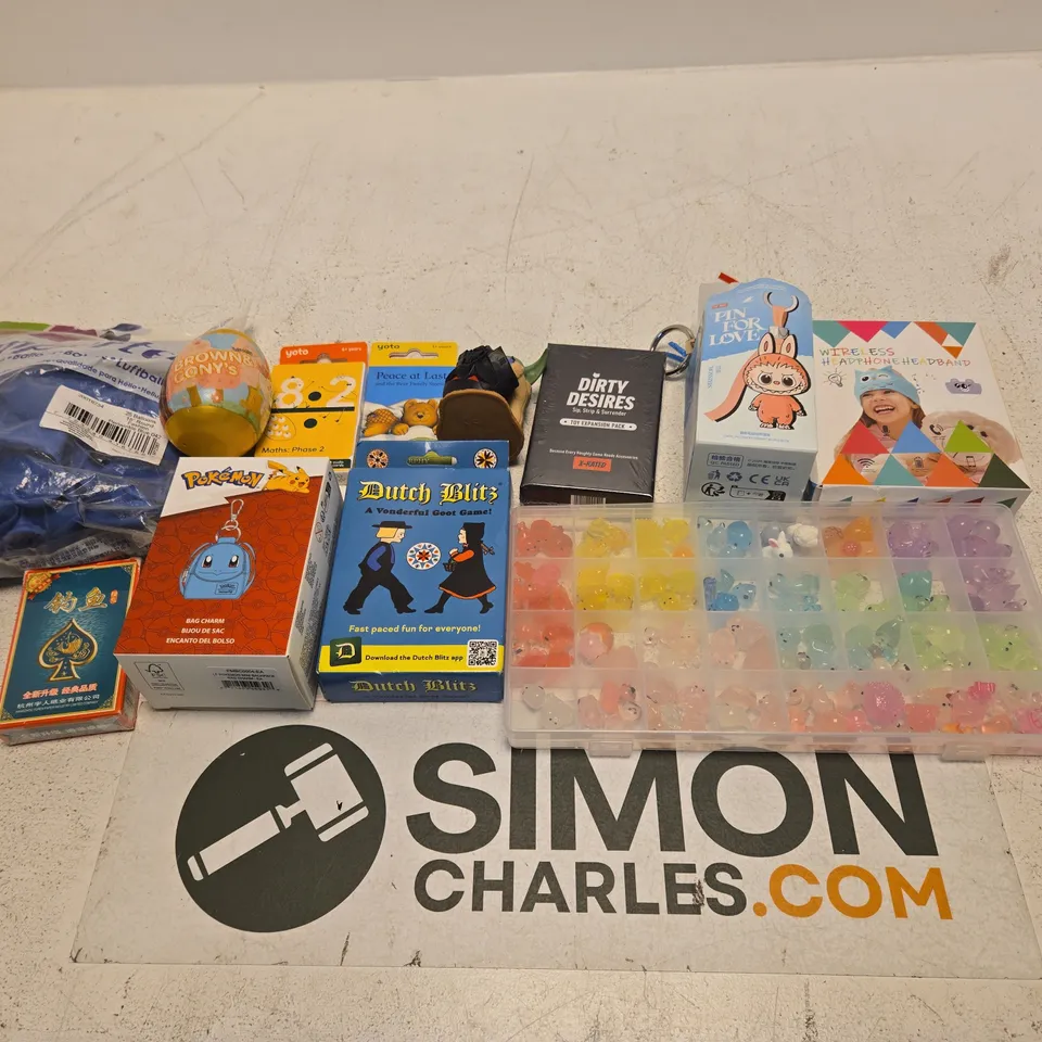 LARGE QUANTITY OF TOYS AND ACCESSORIES TO INCLUDE; BALLOONS, POKEMON BAG CHARM, YOTO STORIES, DUTCH BLITZ, PLAYING CARDS, POP MART PN FOR LOVE AND DIRTY DESIRES