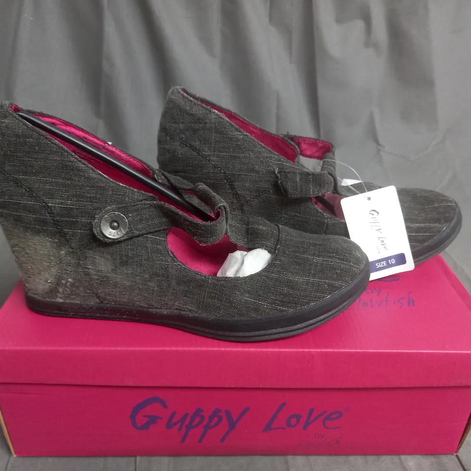 BOX OF APPROXIMATELY 12 BLACK  GUPPY LOVE BY BLOWFISH SHOES IN VARIOUS SIZES 
