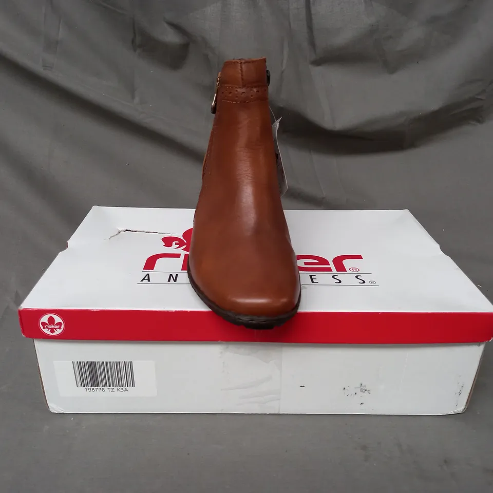 BOXED PAIR OF RIEKER BOOTS IN TAN SIZE 3.5