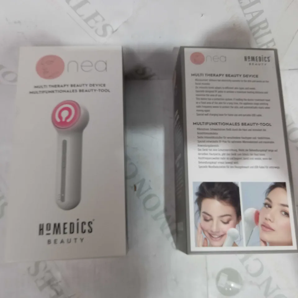 BOX OF APPROXIMATELY 15 HOMEDICS NEA MULTI-THERAPY BEAUTY DEVICES