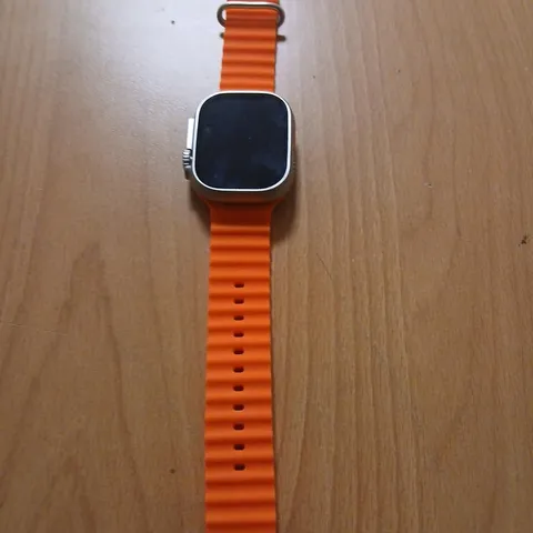 SMARTWATCH WITH ORANGE SILICONE STRAP – TITANIUM & CERAMIC CASE, SAPPHIRE CRYSTAL (GPS + LTE)