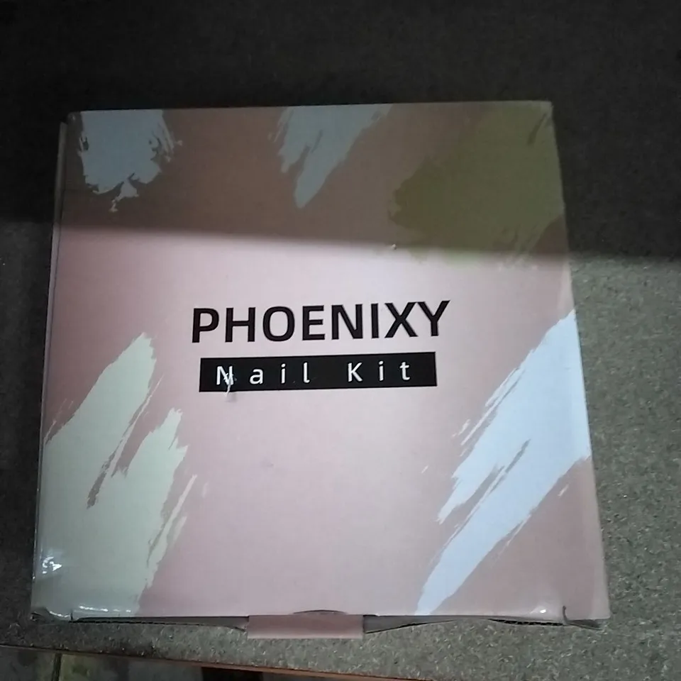 BOXED PHOENIX NAIL KIT INCLUDES NAIL PAINTS, TREATMENTS ETC 