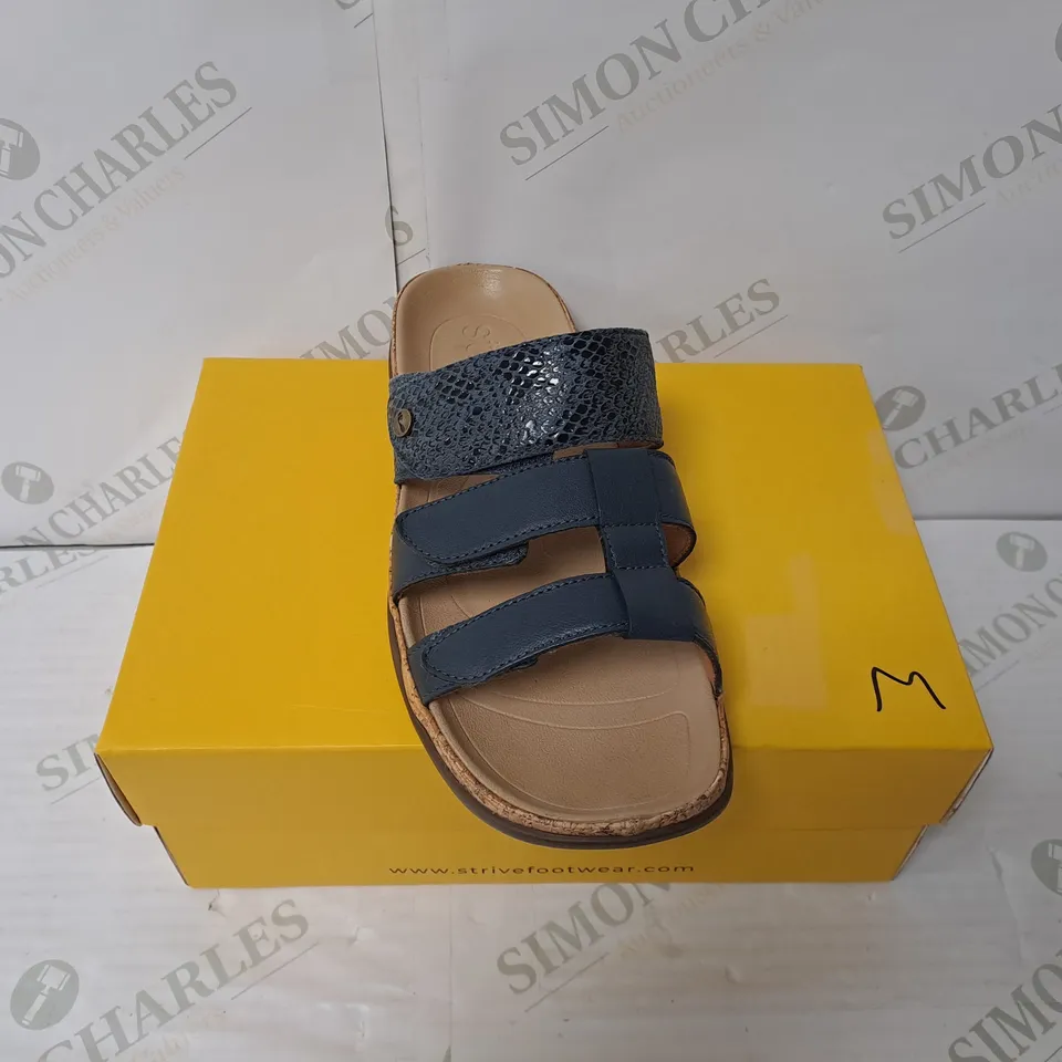 BOXED PAIR OF STRIVE SAMOA TRIPLE STRAP SANDALS IN NAVY SIZE 6