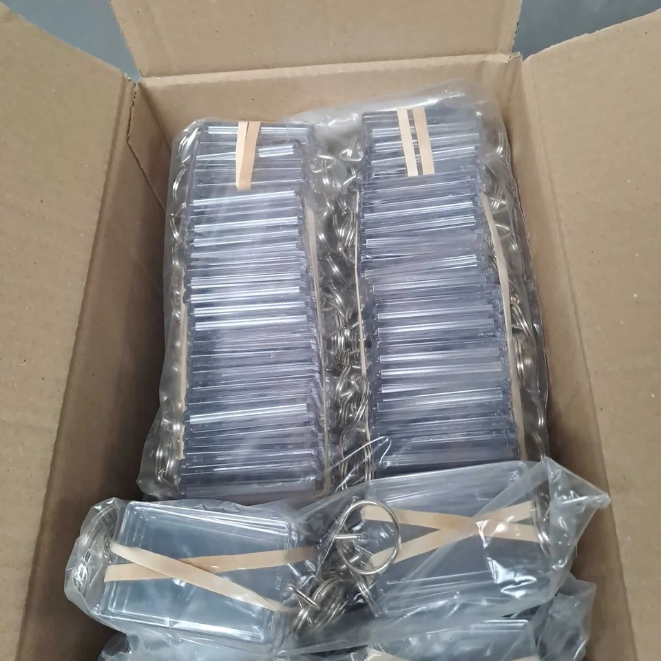BOX OF APPROX 200 CLEAR PLASTIC PHOTO KEYRINGS 