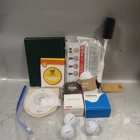 APPROXIMATELY 12 ASSORTED HOUSEHOLD ITEMS TO INCLUDE - GOLF BALLS - MOOPOS REUSABLE POT TOPS - SHO BOTTLE BRUSH - ETC