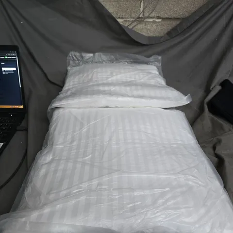 APPROXIMATELY 10 ITEMS  2 X 5 SET OF WHITE CUSHIONS IN PLASTIC PACKAGING.