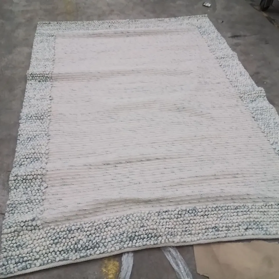 STILLAGE OF APPROXIMATELY 20 QUALITY DESIGNER RUGS