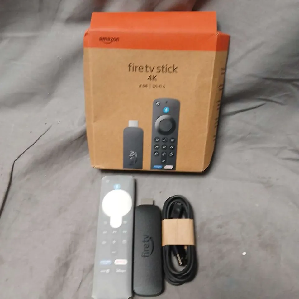 AMAZON FIRE TV STICK 4K WITH ALEXA VOICE REMOTE – BOXED