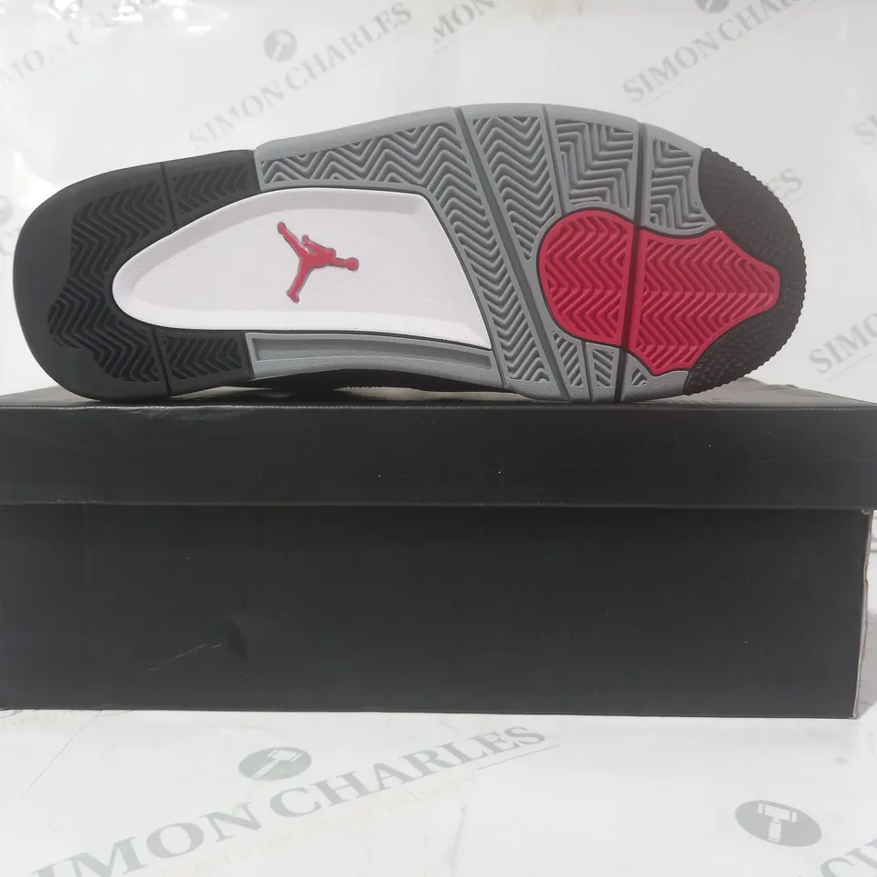 BOXED PAIR OF NIKE AIR JORDAN 4 RETRO SHOES IN BLACK UK SIZE 10